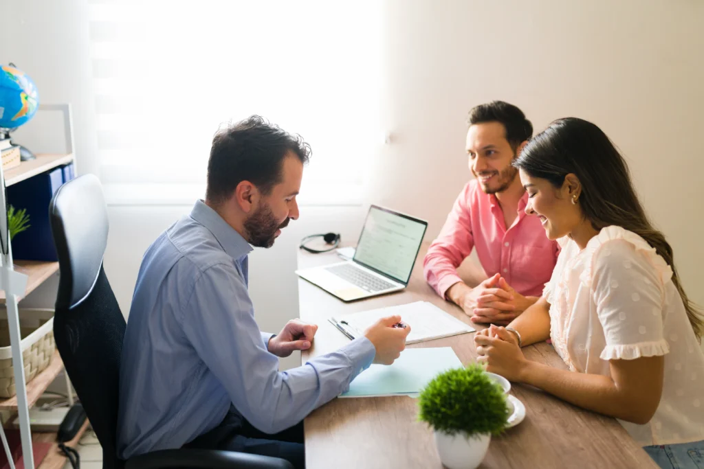 Young man planning vacation for couple